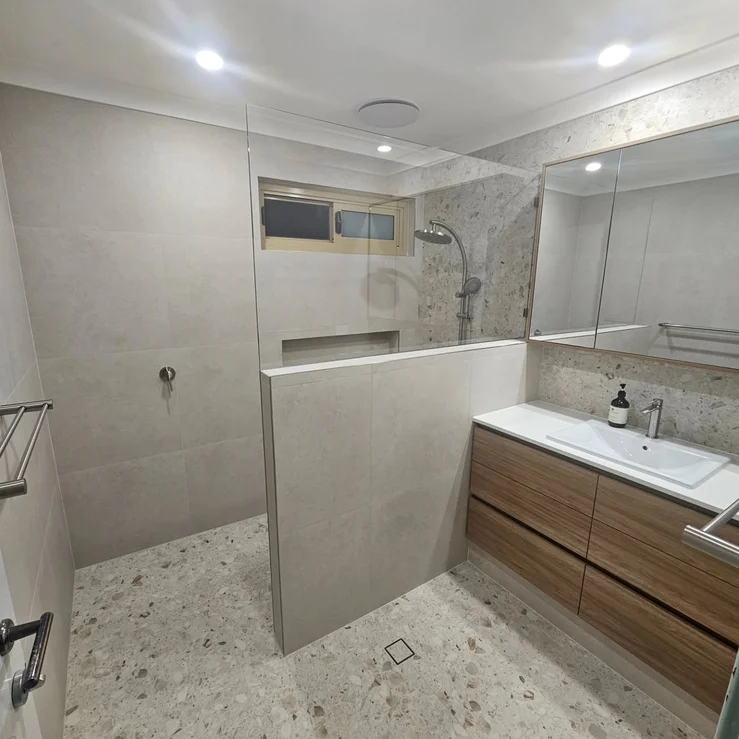 A Modern Bathroom Remodel with Clean Lines; Premium Finishes