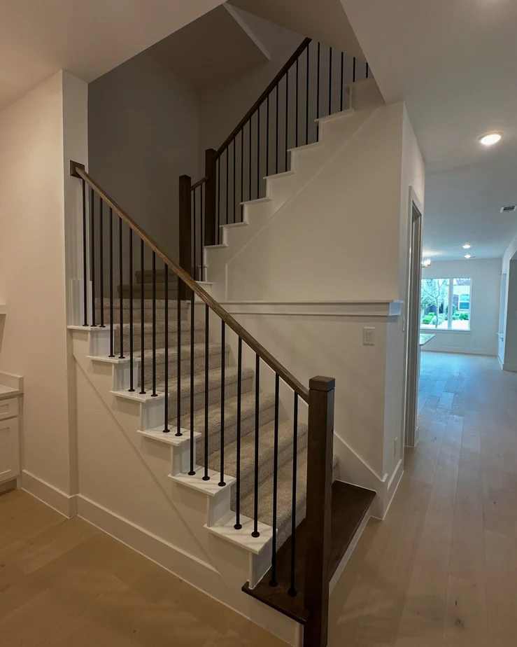 Modern Open Staircase with Wood and Metal Details