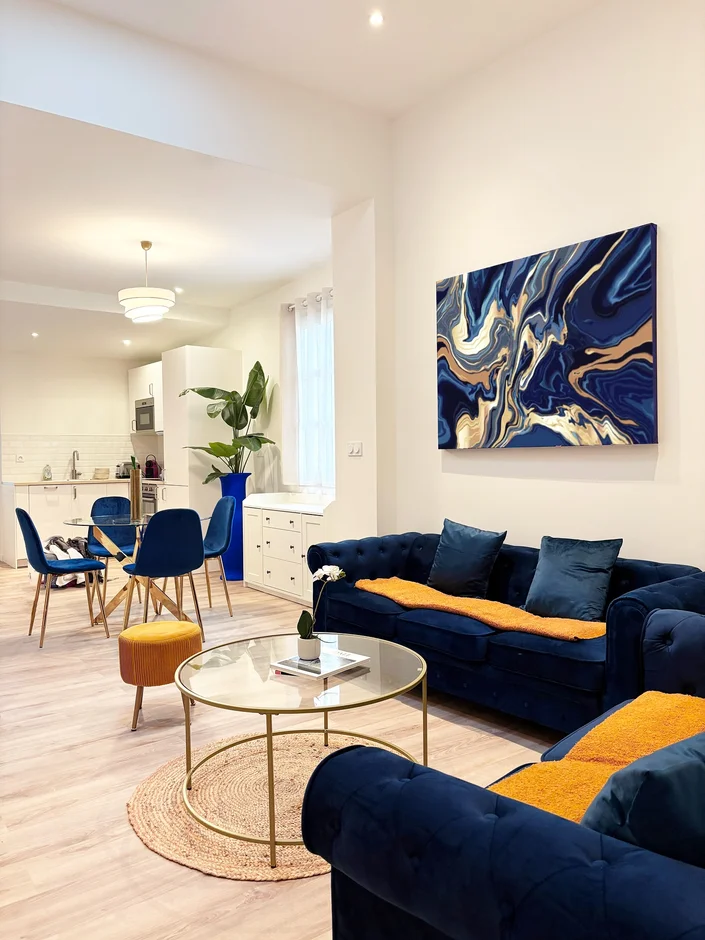 Contemporary Apartment Renovation with Warm Accents